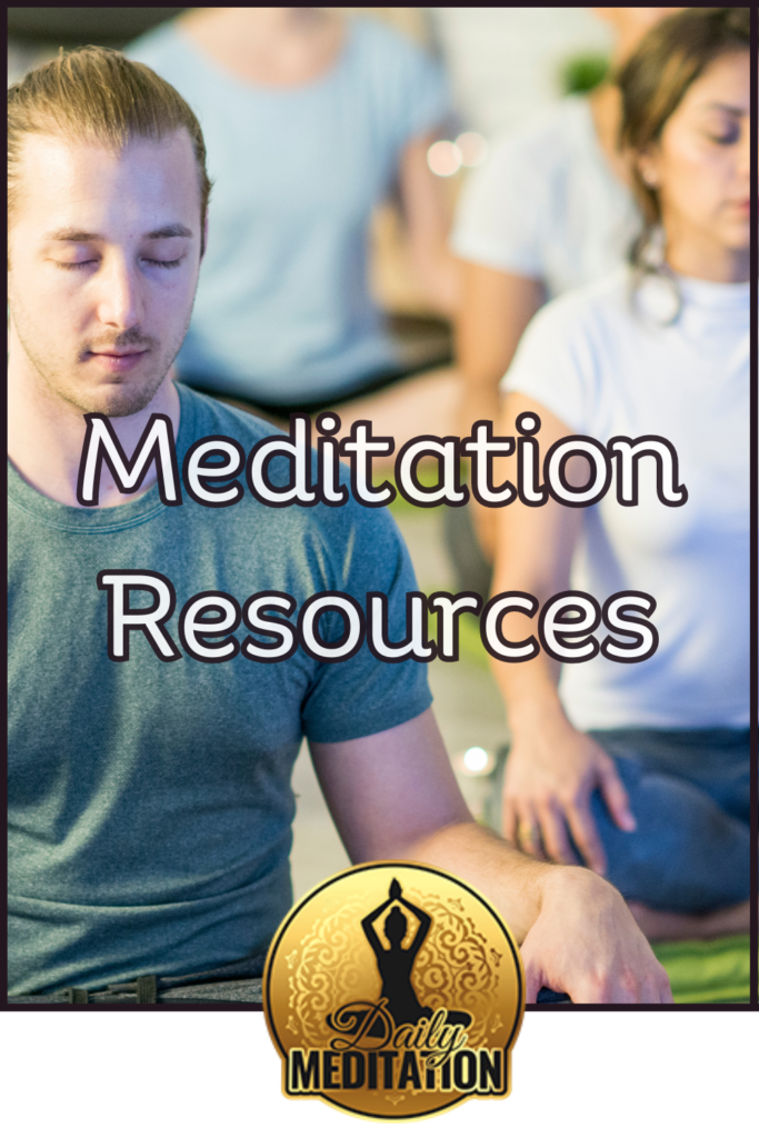 Man meditating in a yoga pose, surrounded by resources.